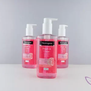 ژل شست شوی روشن کننده صورت نوتروژینا Fresh & Clear with Pink Grapefruit – پاکسازی مؤثر و تازه‌کننده پوست با عصاره گریپ فروت صورتی.